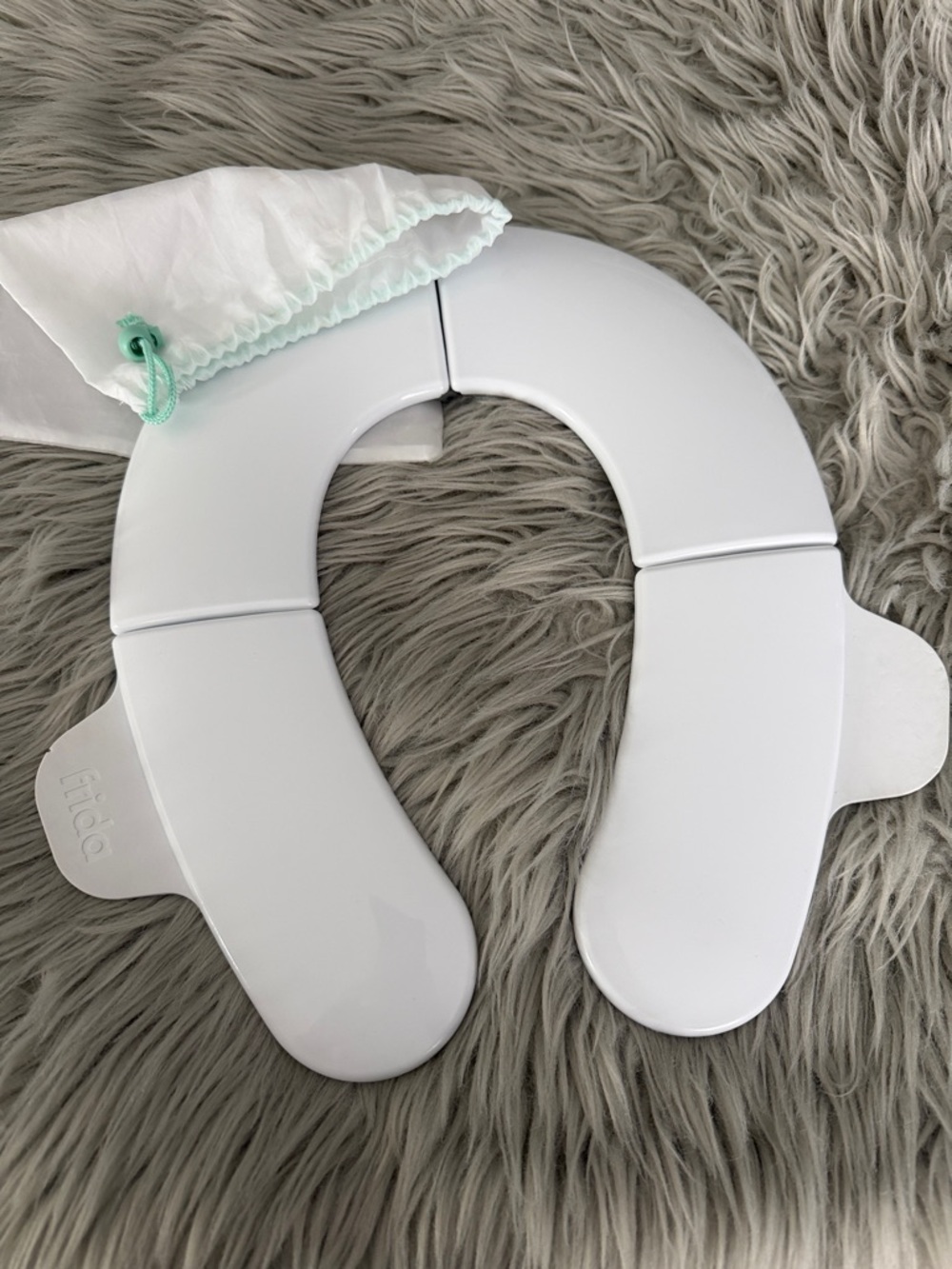 Frida Baby White Folding Travel Potty Seat for Toddlers